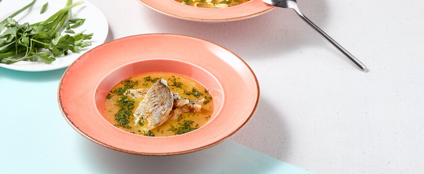 Vibrant Culinary Delight Traditional Fish Soup Ucha with Modern Presentation