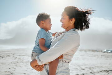 Love, smile and mother with son at beach for travel destination, summer and vacation. Relax,...