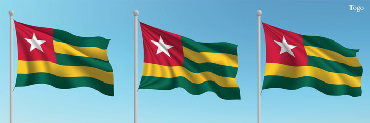 Set of three flags of Togo waving on flagpoles