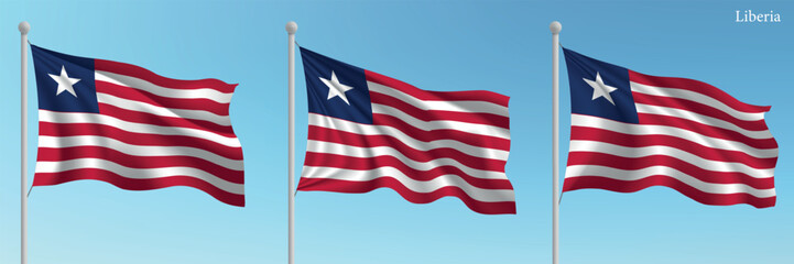Set of three flags of Liberia waving on flagpoles