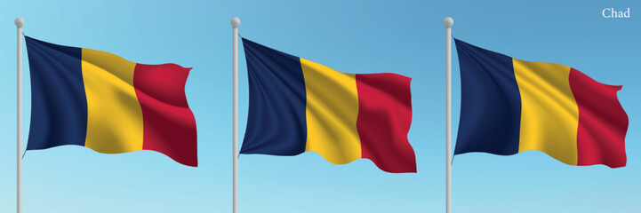 Set of three flags of Chad waving on flagpoles
