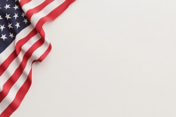 Fototapeta premium American flag bordering white background with copy space