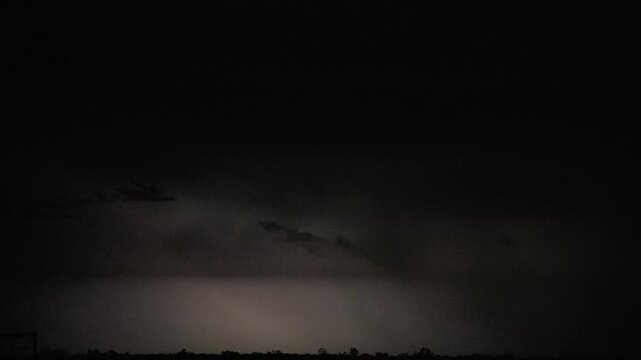 Lightning strikes lighting up the cloudy sky during thunderstorm in Australia.