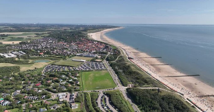 Aerial footage of the cityscape of Zoutelande on a sunny day in Veere city, Zeeland, Netherlands