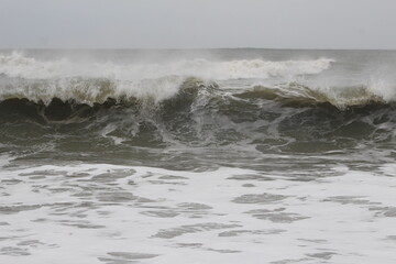 waves breaking on the beach