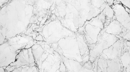 Obraz premium A marble texture background with natural veining in shades of white and gray, offering a sleek and sophisticated surface for luxury branding or interior design visuals