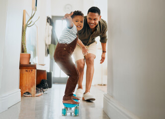 Father, child and skateboard learning in home with boy, smile and game together with care. Support, love and balance with growth, development and fun with teaching and African family with joy © peopleimages.com