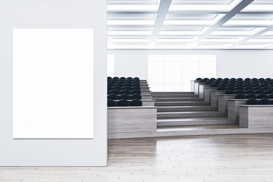 Modern wooden and concrete auditorium interior with empty white mock up banner on wall, panoramic windows, city view and daylight. 3D Rendering.