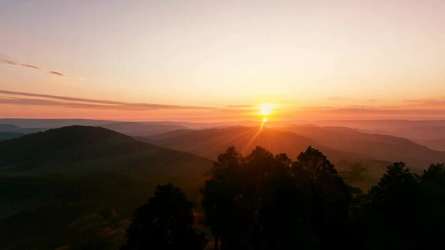 A 360-degree video with soft light, capturing a camera fly around a sunset/sunrise with golden hues, silhouettes, and a tranquil atmosphere