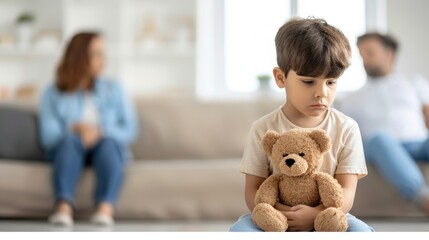 Sad child holding teddy bear with concerned parents in background, family tension.
