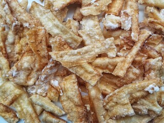 Kripik singkong or cassava chips shoot on close up. Indonesian traditional foods famous in Java 