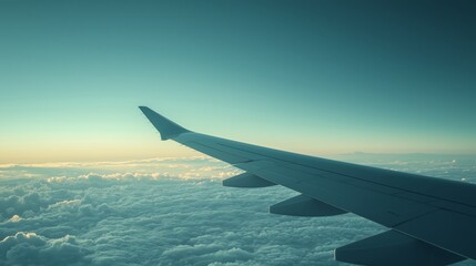 Obraz premium Minimalistic View of Airplane Wing Above Clouds