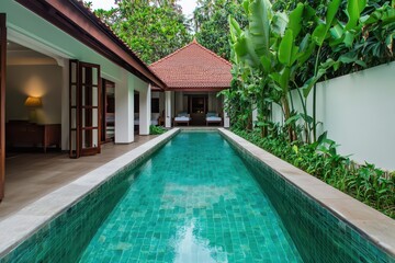 Fototapeta premium Private oasis swimming pool nestled in lush greenery, offering a serene escape for relaxation and tranquility.