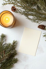 White greeting card mockup with candle on table.  AI generation.