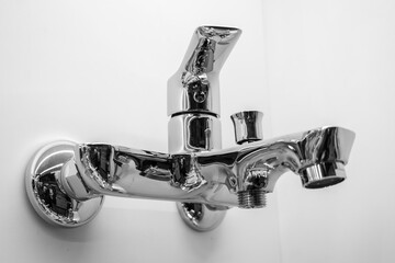 Chrome water tap. Modern stainless steel water faucet
