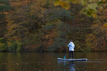 Paddleboarding in Autumn Serenity