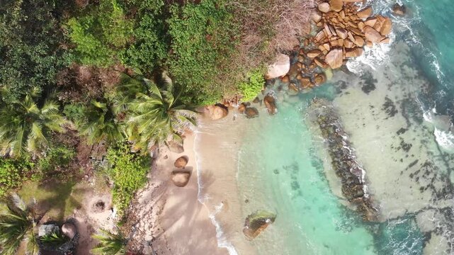 Beach on the south coast of Island Praslin, Seychelles, Africa.   
Aerial view of a the beach, Island Praslin, Seychelles. 