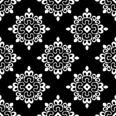 Fototapeta premium Ikat seamless pattern, geometric design, motif ethnic handmade, Ikat ethnic tribal, boho colors seamless wallpaper. Ethnic Ikat abstract background art,