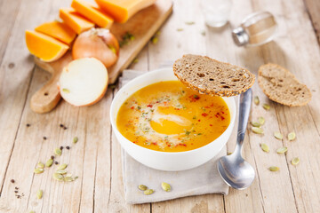 bowl of soup with slice of bread