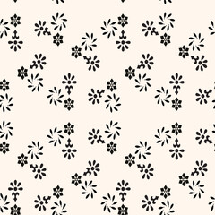 This stylish black floral pattern set against a soothing beige background is absolutely perfect for textiles and design