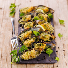 baked mussels with butter and parsley