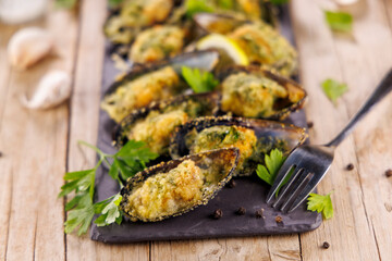 baked mussels with butter and parsley