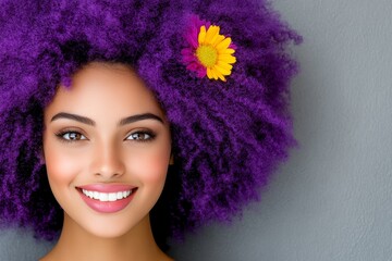 Girl with pink hair is smiling and has her mouth open. She has a pink ponytail and her hair is blowing in the wind. girl with magenta hair on gray background