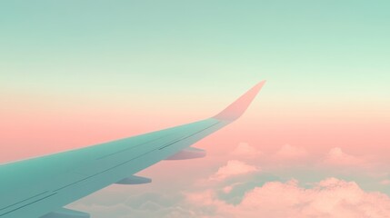 Fototapeta premium Airplane wing over clouds with a pink and blue sky in the background.