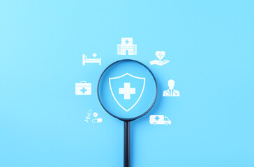 Health Insurance and Medical Care Concept. Focuses on medical shield icon with healthcare symbols...