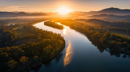 breathtaking sunrise over winding river, surrounded by lush greenery and distant mountains. warm golden light reflects beautifully on water, creating serene and tranquil atmosphere