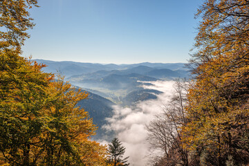 Beautiful autumn mountain landscape framed by colorful autumn trees. Pieniny Mountains. View from the trail to the Trzy Korony peak. Sromowce Nizne, Poland © p  a  t  r  i  c  k