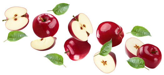 flying red apples with green leaves isolated on white background. clipping path