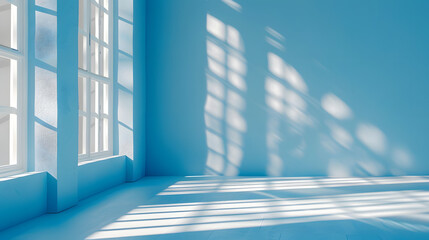 Obraz premium Minimalistic simple abstract light blue background for product presentation. Shadow and light from windows on wall