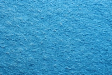 Obraz premium Silhouette texture of blue handmade paper in macro