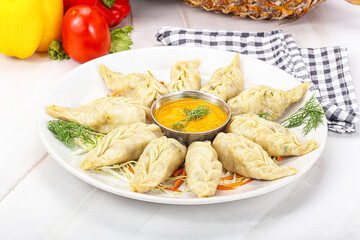 Steamed asian dumpling momo with meat