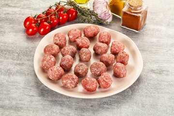 Uncooked raw beef meatball minced