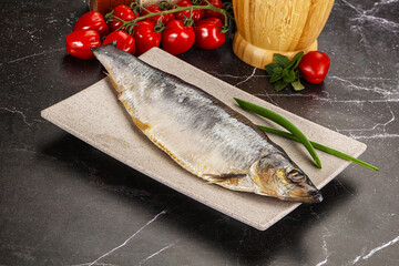 Whole raw salted herring fish