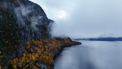Drone Aerial View of Misty Norwegian Fjord in Autumn