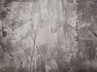 Distressed Concrete Texture: A rough, textured surface with a distressed, weathered appearance....
