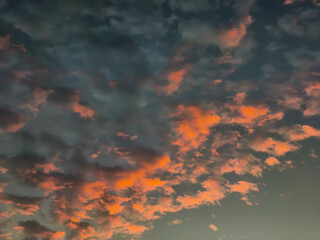 Fototapeta premium Beautiful sunset with clouds in the sky. Nature background and texture.