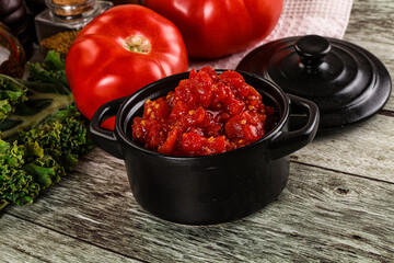 Diced ripe tomato with sauce