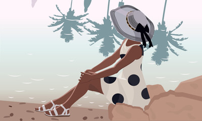 a girl dressed in a retro dress and hat sits on the shore and enjoys the beautiful sea