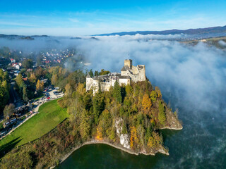 Medieval Castle in Niedzica, Poland, in fall with fog. Aerial view
