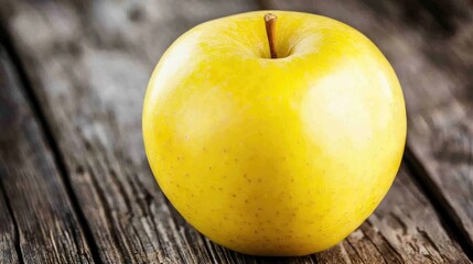 Fresh Yellow Apple on Rustic Wooden Surface