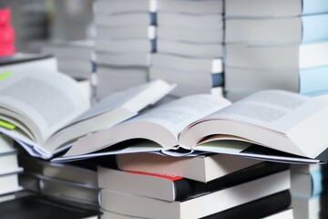 pile of books. stack of books on the table. open book