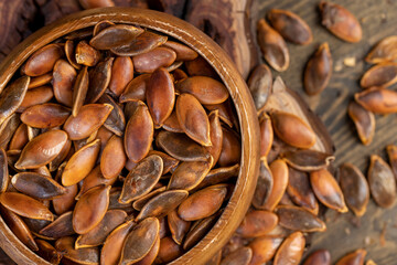 , overcooked or burnt pumpkin seeds on the table