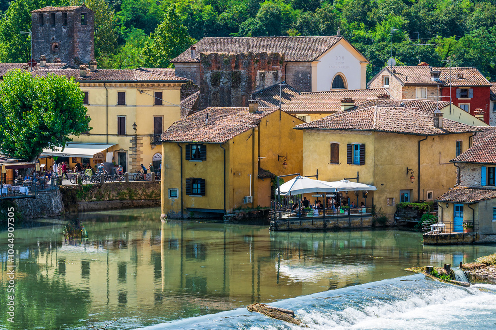 Wall mural Summer on the Mincio river. Historic village of Borghetto sul Mincio