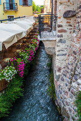 Summer on the Mincio river. Historic village of Borghetto sul Mincio