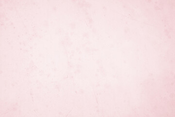 Obraz premium A vintage pink paper texture background with a grunge feel, perfect for art and design projects.