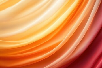 Colorful silk fabric draping, showcasing vibrant orange and red hues in a soft, flowing pattern.